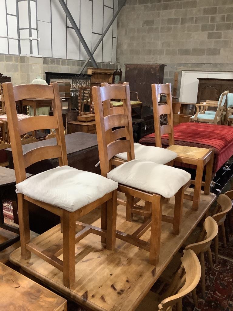 A set of four rush seated dining chairs